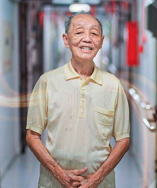 portrait of old man smiling at camera