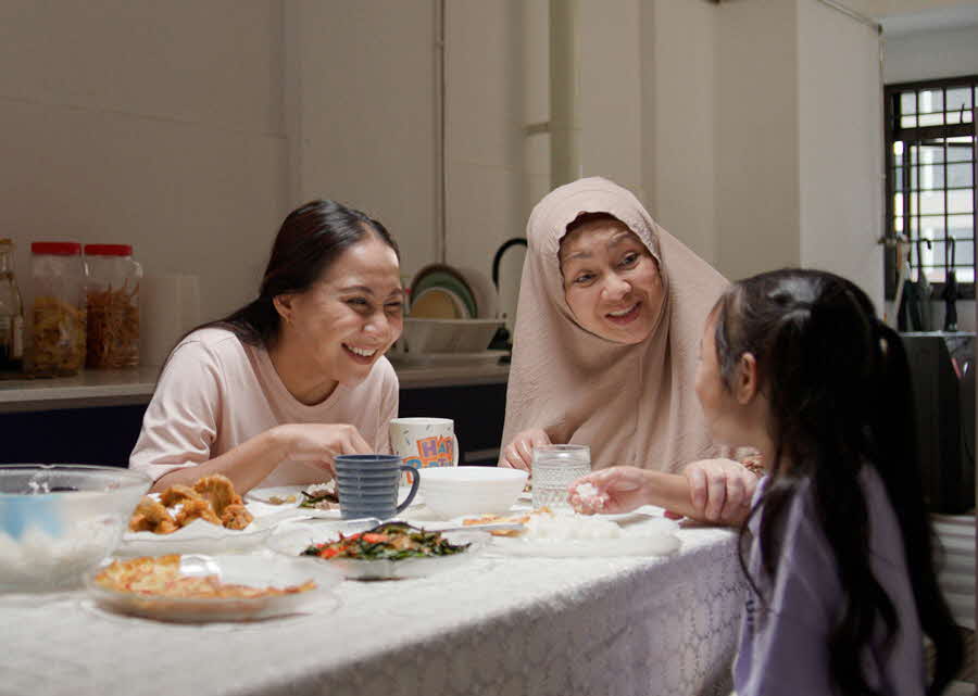 Image of malay family having dinner